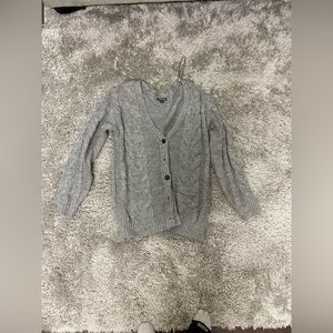 Annal gray sweater from target. Comes with buttons down it.